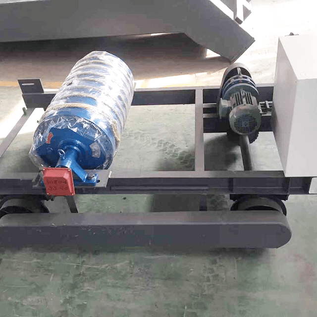 Máquina distribuidora reversible